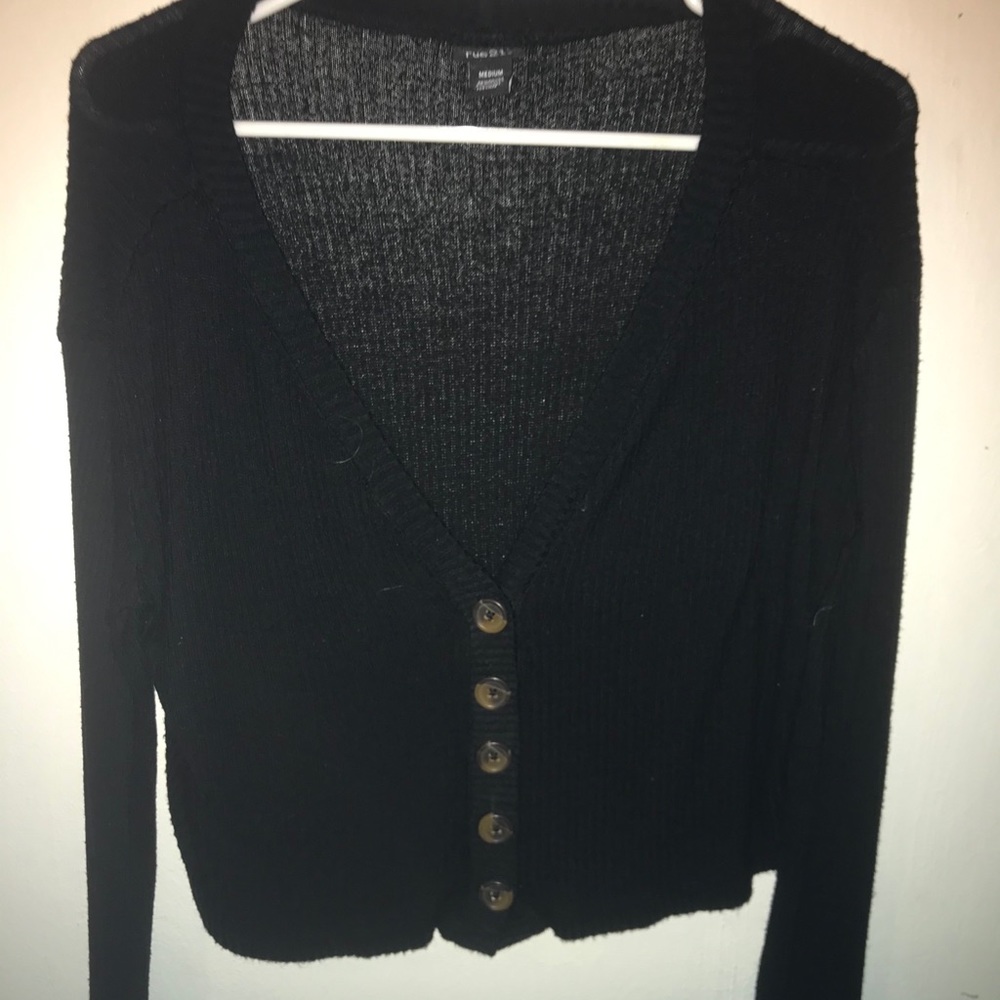Black half button long sleeved shirt